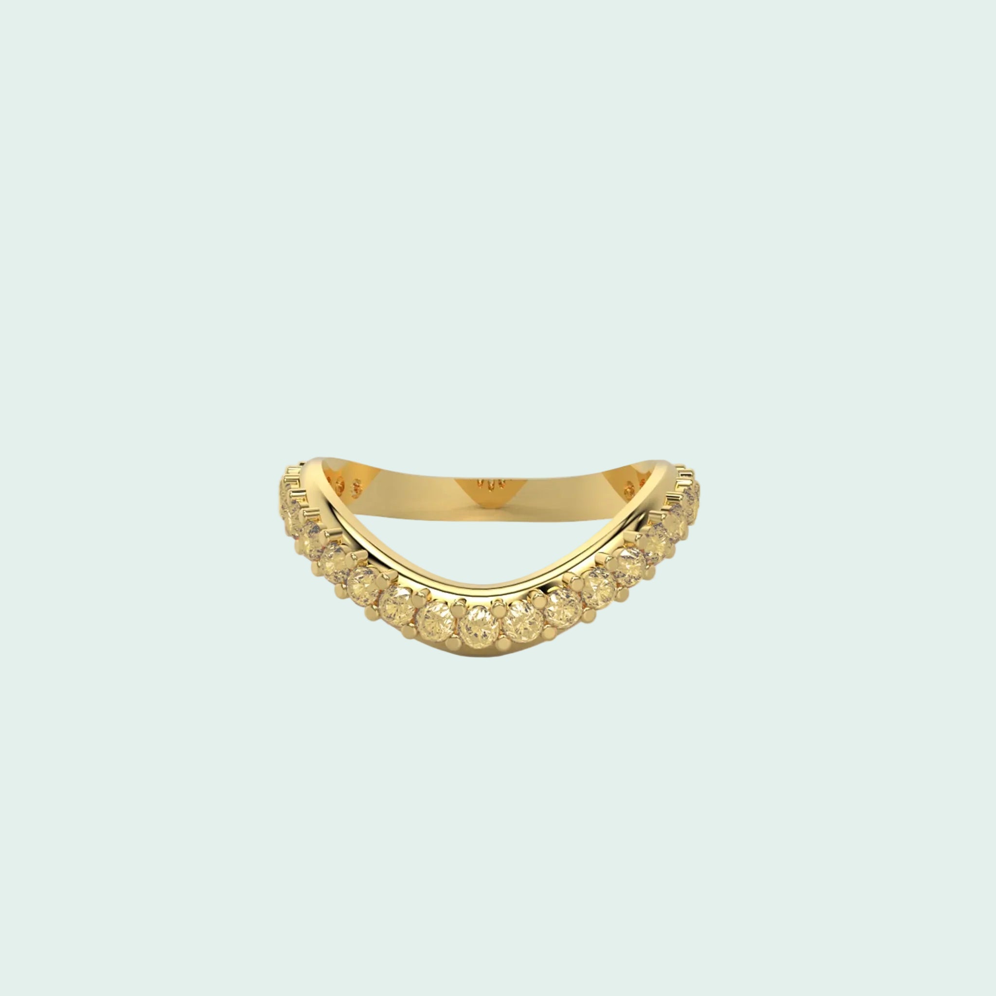 Gold ring with small stones on a white background