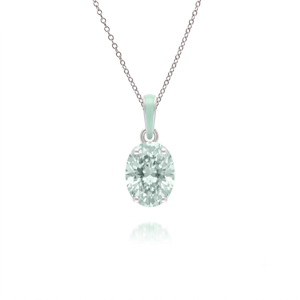 An oval-cut light green gemstone pendant necklace in a silver-toned setting on a delicate chain, shown against a plain white background with a faint reflection below.