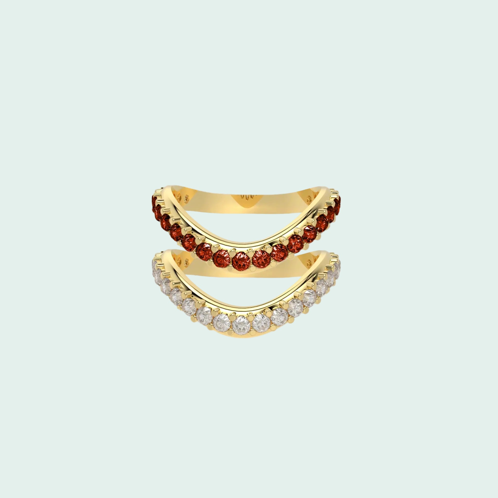 Gold ring with red gemstones and white stones on a white background