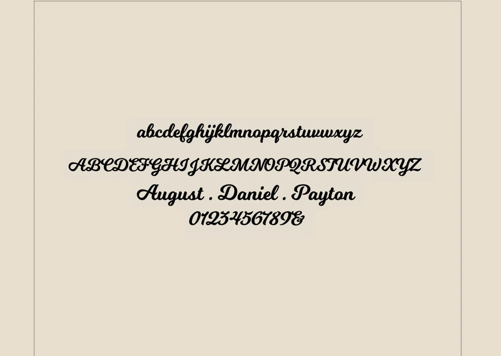 Display of a cursive font on a beige background