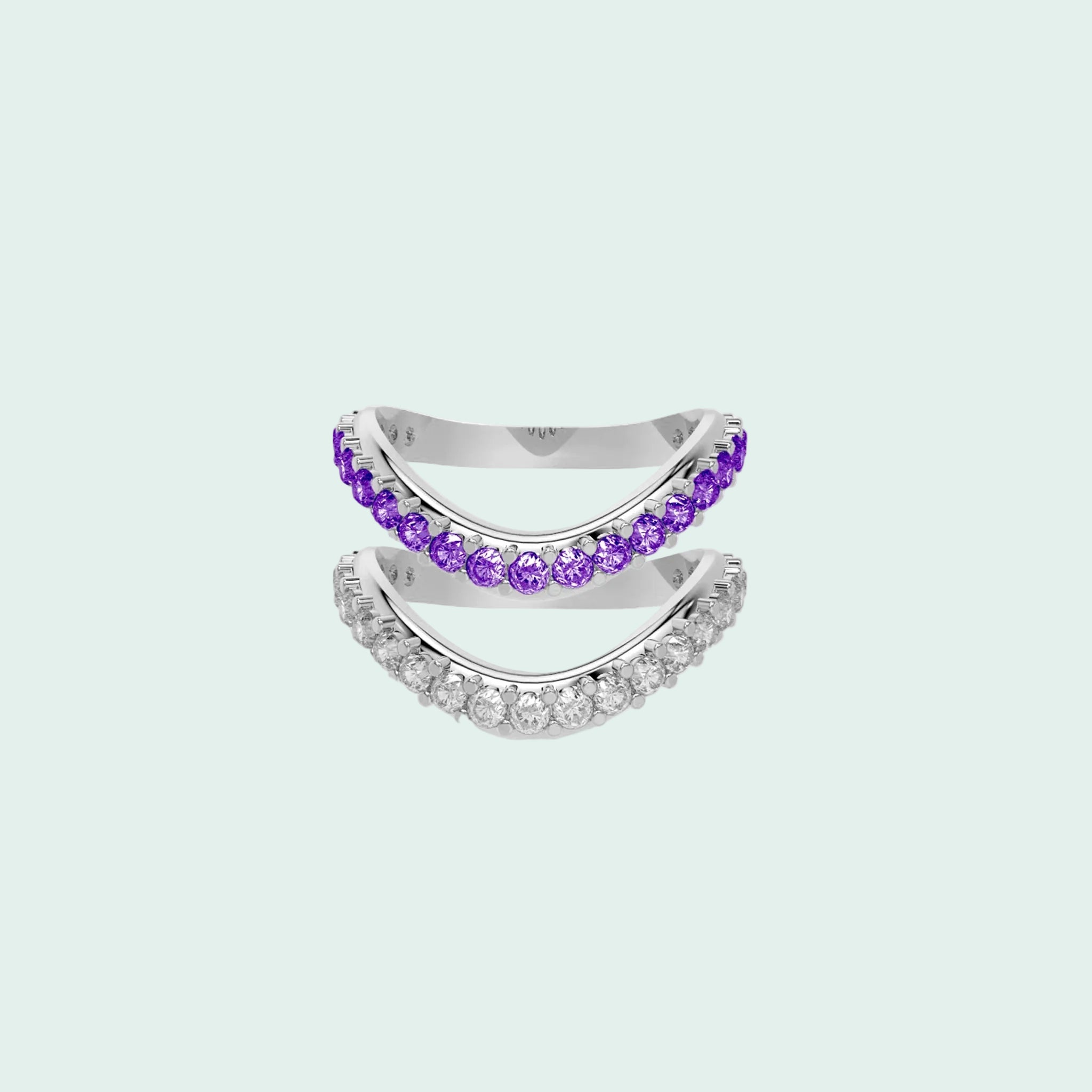 Silver ring with purple gemstones on a white background