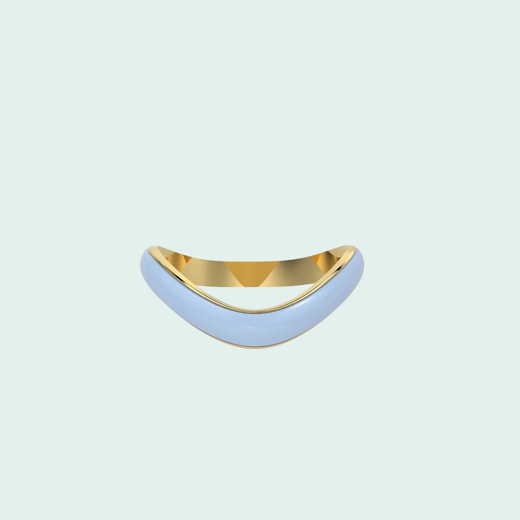 Crescent-shaped object with gold top and light blue base on a white background