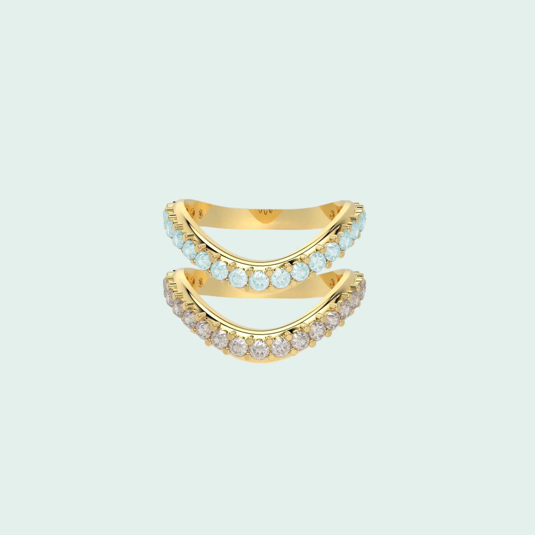 Gold ring with blue gemstones on a white background