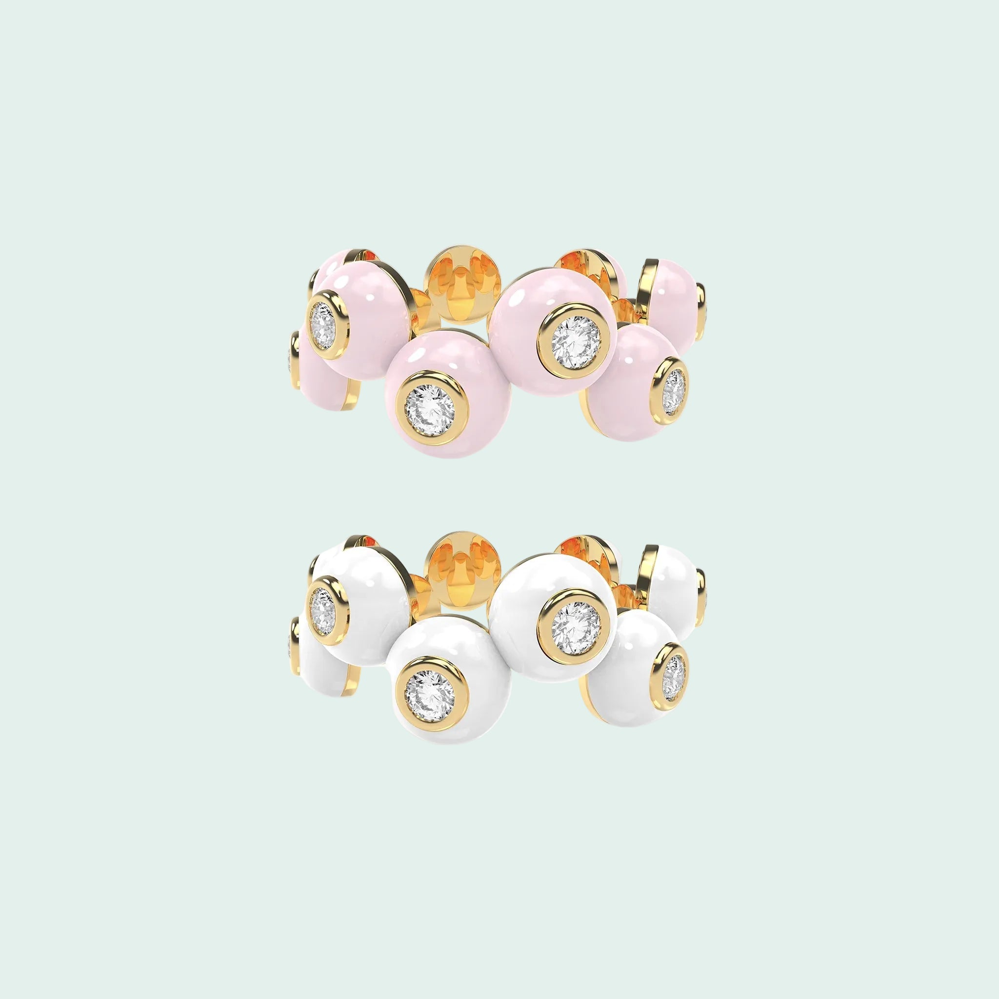Set of three rings with pink, white, and gold colors on a white background