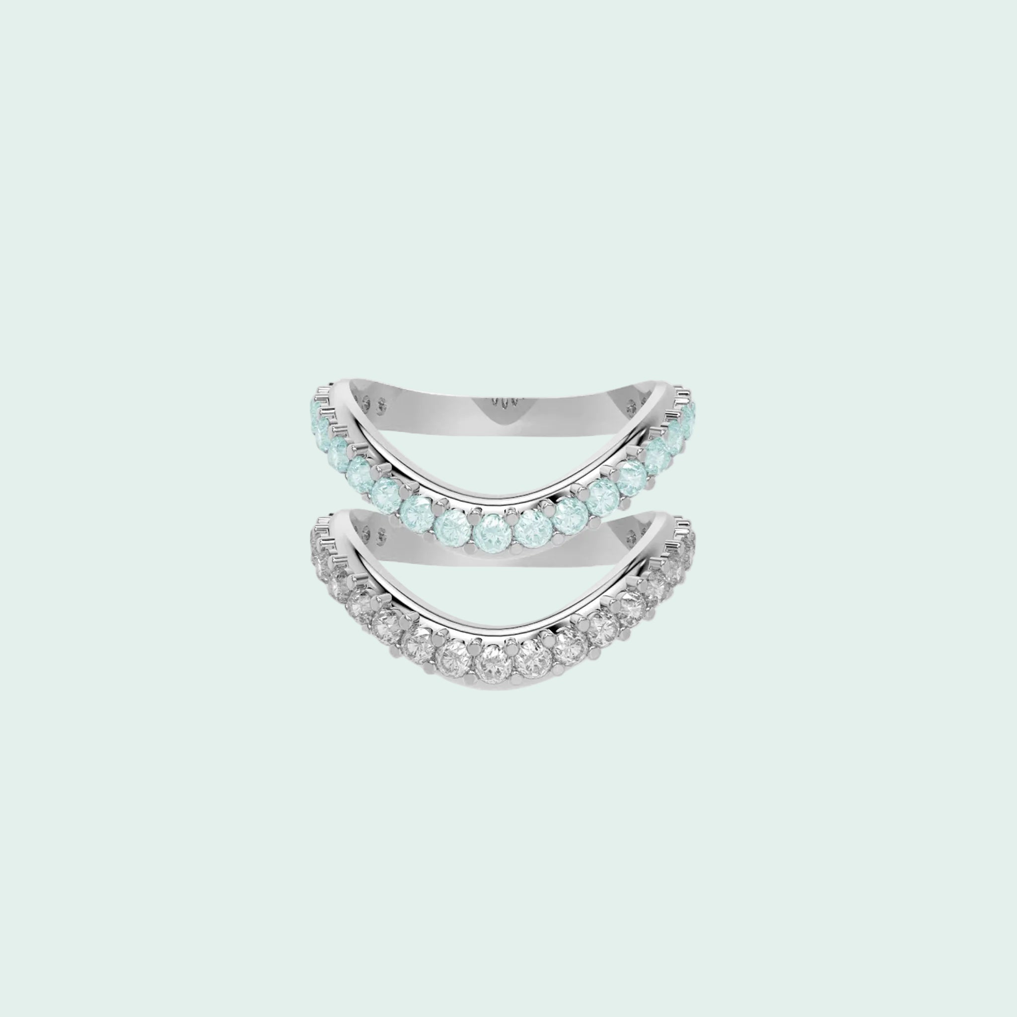 Two silver rings with gemstones on a white background