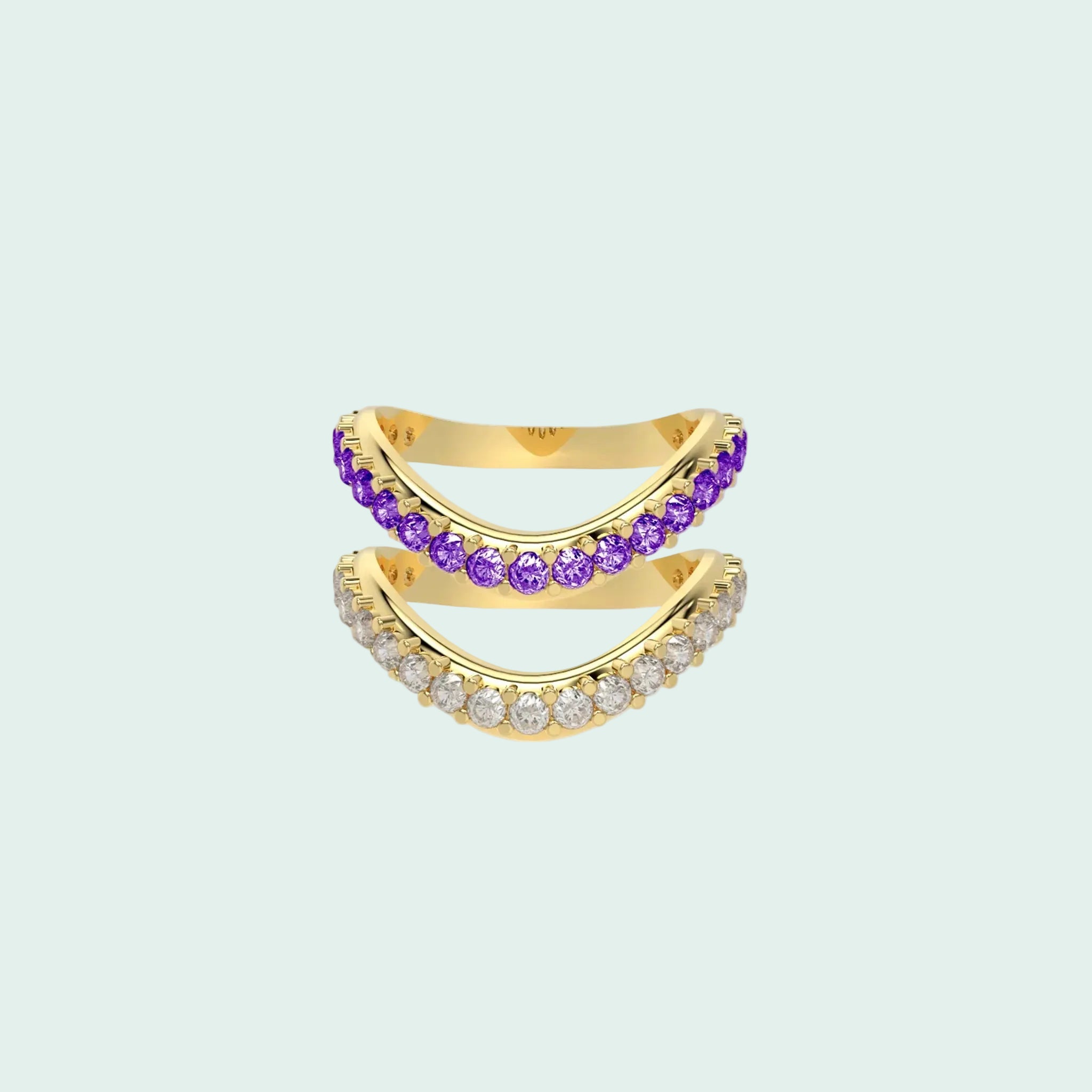 Gold ring with purple gemstones on a white background