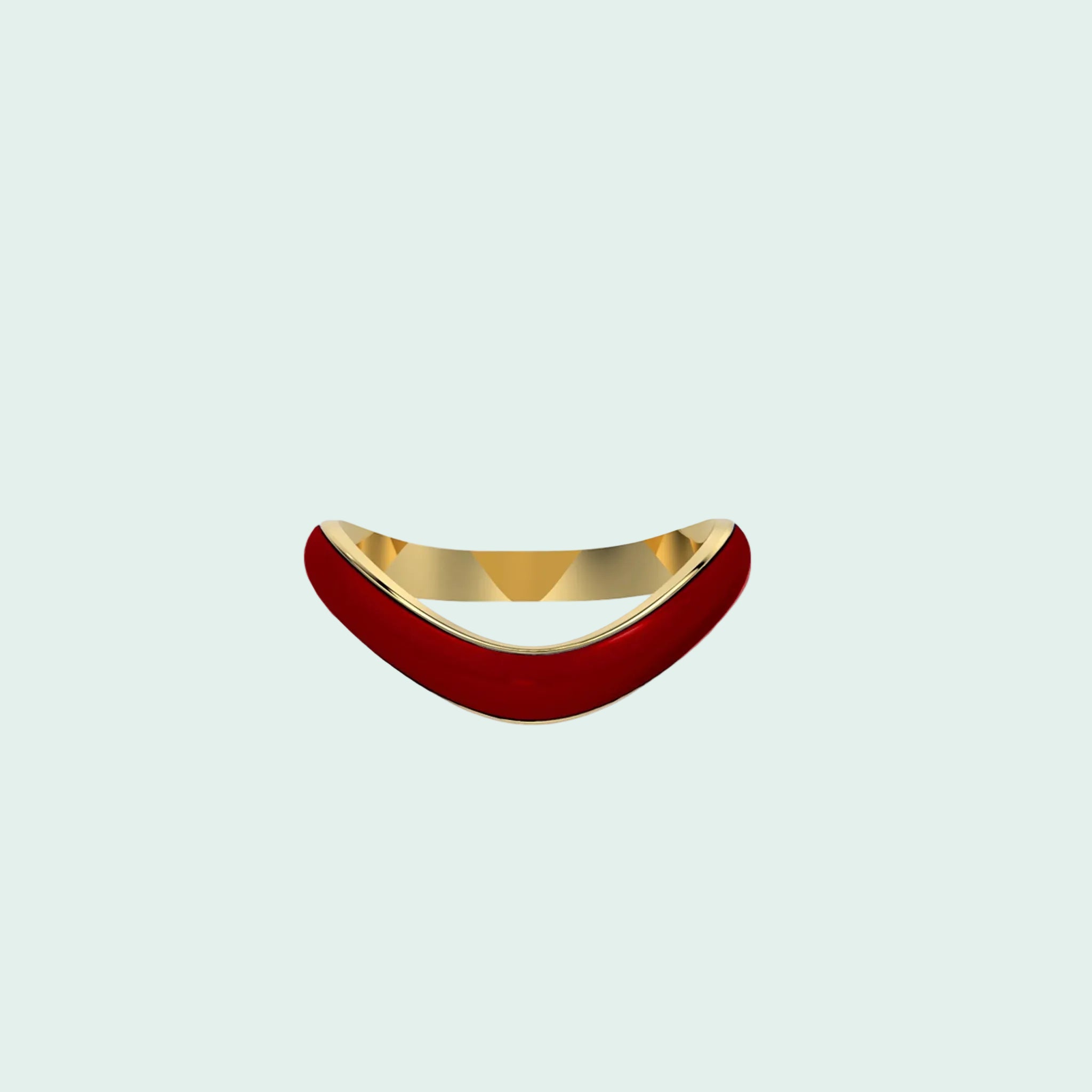 Gold and red ring on a white background