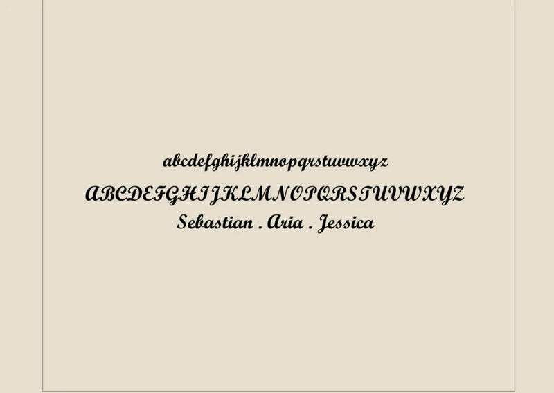 Display of a decorative font on a beige background