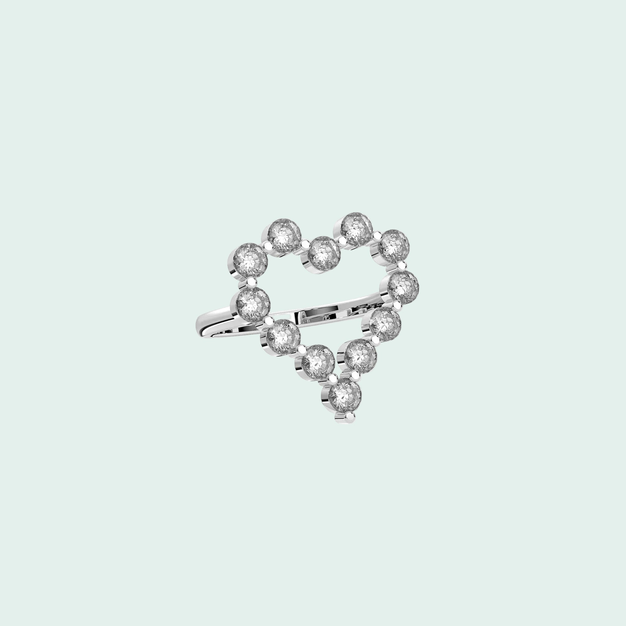 Heart-shaped diamond ring on a white background