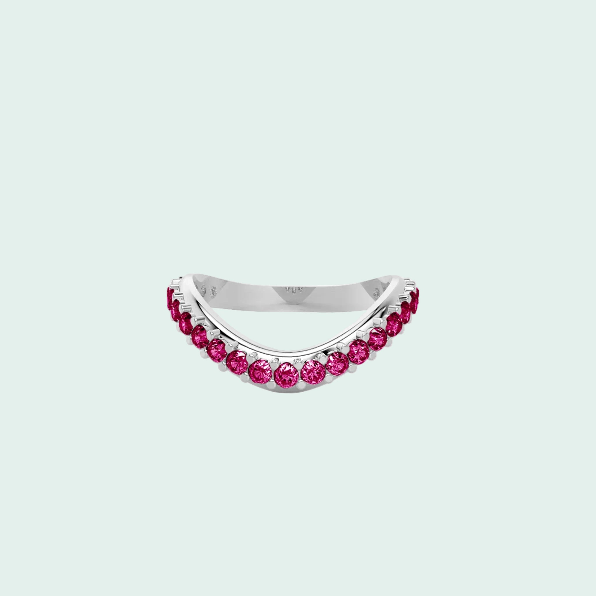Silver ring with pink gemstones on a white background